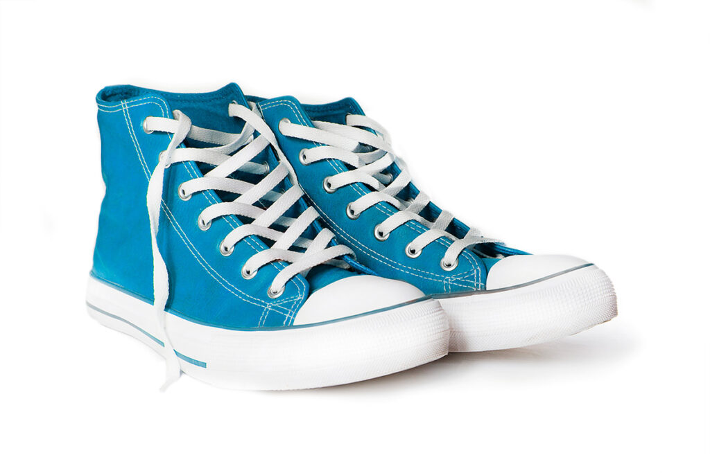 pair of blue high top sneakers a person might choose to donate