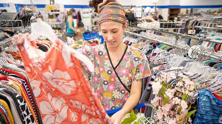 young woman shopping at Goodwill