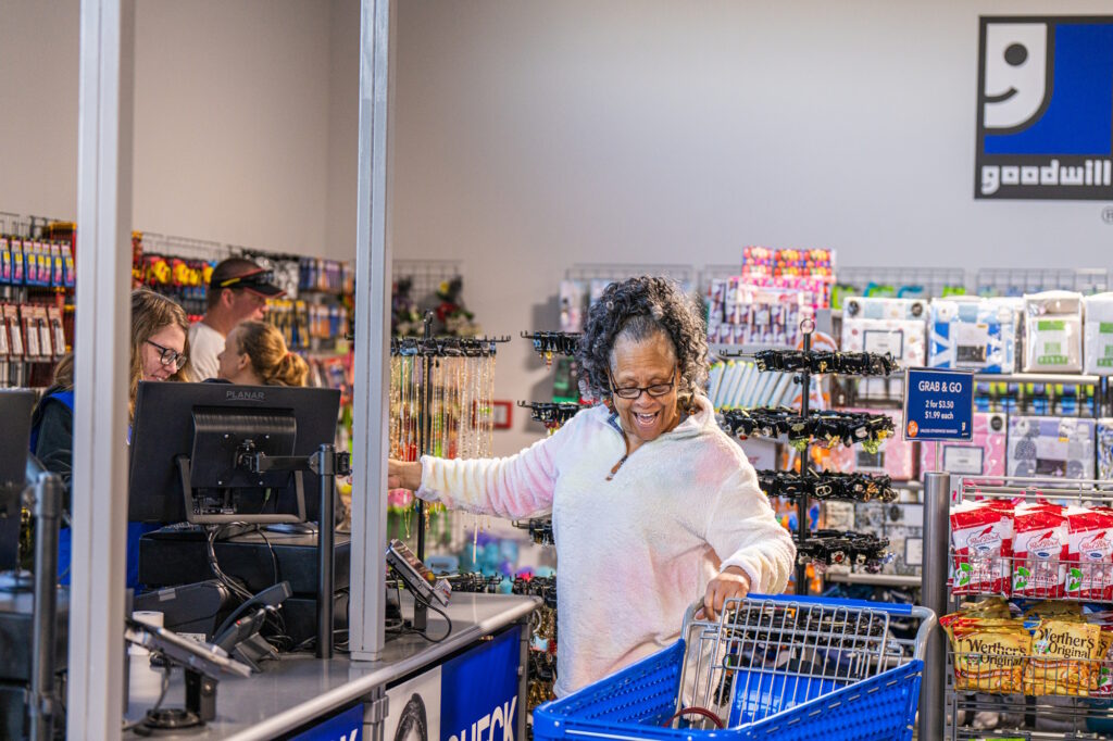 A woman paying for his purchases