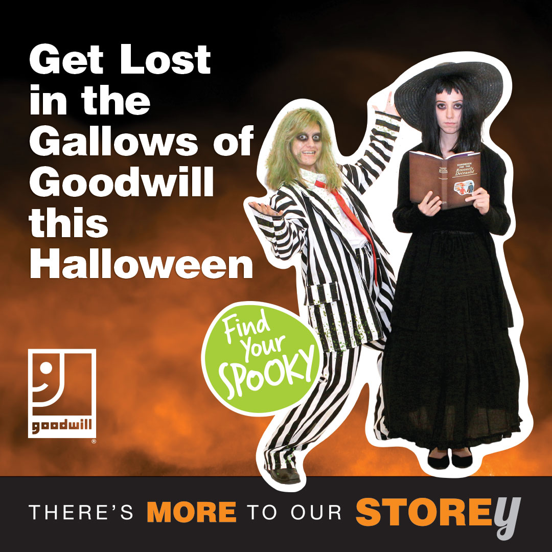 Two people dressed in costum, one as Bettlejuice and one as Wednesday Addams